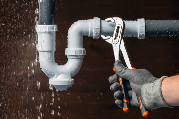 Professional Drain Cleaning technician working in Midland, MI